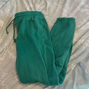 TNA JOGGERS SIZE SMALL GREEN